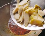 A picture of step 3 of Raw Mango curry.