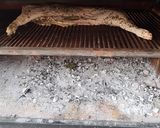 Foto del paso 2 de la receta: 1/2 lechón a la parrilla