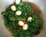 Foto langkah ke 7 dari resep Kangkung cah telur puyuh.