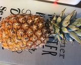 Une image de l'étape 1 de Salade d'ananas mariné aux fruits confits.