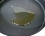 A picture of step 2 of Garlic and Herb Bread Crisps.