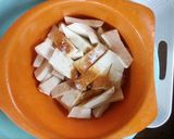 A picture of step 1 of Peppered fried yam and fish.