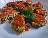 Parsley Lauki muthiya topped with pizza sezhwan sauce recipe step 7 photo