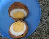 A picture of step 4 of Scotch/ scorch eggs.