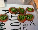 A picture of step 11 of Composed Salad with Black Tomatoes, Cucumber, Red Onion, Feta, and Parsley.