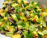 A picture of step 1 of Pineapple, cucumber, red onion and chilli Salsa.