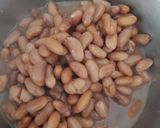 A picture of step 1 of Fried Kholar Beans with Napa (Kidney Beans with Basil).