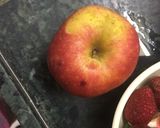A picture of step 1 of Strawberry-Apple smoothie with cinnamon powder.