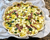 Foto del paso 6 de la receta: Pizza rústica de jamón serrano, patatas y calabacín