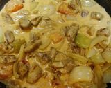 A picture of step 6 of Coconut Chicken Curry.