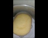 A picture of step 9 of Australian cake.. chocalate toping on vanilla cake.