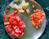 A picture of step 1 of Sooji/Semolina Potato, Tomato, Carrot Upma(no onion garlic).