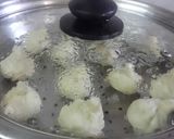 A picture of step 2 of Steamed Coconut Dumplings in Kheer.