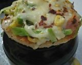 A picture of step 7 of Idli-Pizza bites.