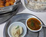 A picture of step 8 of Suji Thattu idli.