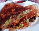 A picture of step 5 of 5-Ingredient Cheesesteak & Avocado quesadilla.