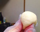 A picture of step 2 of Homemade Fluffy Round Bread with Bread Machine.