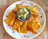 A picture of step 8 of Peri peri Nachos.