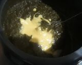 A picture of step 1 of Sarso saag with makke ki roti.