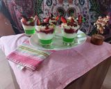 A picture of step 4 of Pista custard with banana jelly & plum jam.