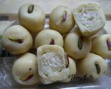 A picture of step 8 of Rasgulla stuffed Peda.