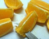 A picture of step 2 of How to Cut a Navel Orange.