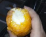A picture of step 3 of Mango stuffed kulfi.