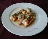 Foto del paso 6 de la receta: Chipirones a la plancha, con picada de ajo y perejil