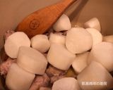 A picture of step 6 of Braised Pork with Daikon Radish.