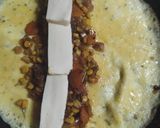 Foto del paso 5 de la receta: Omelette de cebollas caramelizadas, zanahoria y choclo..