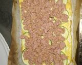 Foto del paso 4 de la receta: Rollo de calabacín con carne picada y queso rallado