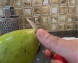 A picture of step 1 of Mangai Sadum / Raw Mango Rice.