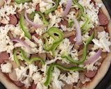 A picture of step 7 of Sausage pizza.