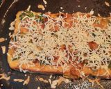 A picture of step 4 of Cheese pudla sandwich.