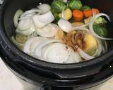 Foto del paso 2 de la receta: Caldo de Costillas Asadas y Pollo
