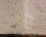 A picture of step 2 of Bread pin wheel sandwich.