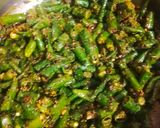A picture of step 2 of Green chilli pickle.