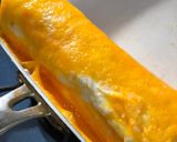A picture of step 6 of Japanese white and yellow Egg Roll.