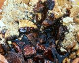 A picture of step 2 of No bake biscuit cake.