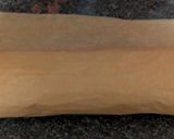 A picture of step 4 of Lemon curd Swiss roll.