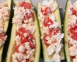 A picture of step 2 of Feta and tomato stuffed courgettes.