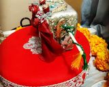 A picture of step 7 of Mehndi n Nikah Themed Cake.