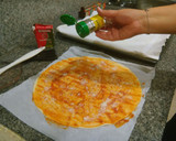 Foto del paso 4 de la receta: Palmeritas de hojaldre con sabor a pizza
