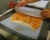 Foto del paso 5 de la receta: Palmeritas de hojaldre con sabor a pizza