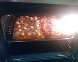 Foto del paso 5 de la receta: Pizza mixta de bacon y palmitos con salsa rosa