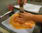 Foto del paso 3 de la receta: Palmeritas de hojaldre con sabor a pizza