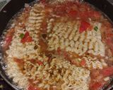 A picture of step 3 of Maggi pizza.