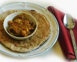 A picture of step 6 of Kabuli Chana Eggplant Masala Curry.