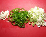 Foto del paso 4 de la receta: Arroz con lentejas amarillas, malvas y alcachofas