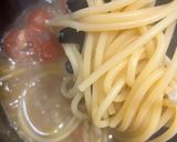 A picture of step 7 of Anchovy and tomato bucatini pasta.